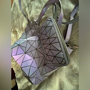 Women’s holographic geometric purse and wallet.